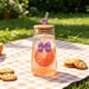 thumbnail image 1 of Vaso de agua de vidrio con tapa y pajita – Vaso térmico de 450 ml para café, té o bebidas frías – Pajita de vidrio reutilizable y funda protectora para el hogar, la oficina o para uso en exteriores., 1 of 6