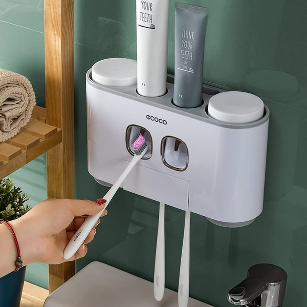 Soporte para cepillos de dientes con dispensador de pasta de dientes montado en la pared