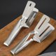 thumbnail image 1 of Pinzas para bistec, pinzas de cocina 3 en 1, espátula de doble cara, pinzas de espátula multifuncionales de acero inoxidable para voltear alimentos de 10,6 pulgadas Clip2, 1 of 5