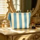 thumbnail image 5 of Bolsa de Almacenamiento de Pana a Rayas con Forma de Concha Marina: Neceser de Viaje, Organizador de Artículos de Aseo Moderno y Portátil para Maquillaje y Artículos Esenciales de Uso Diario., 5 of 7