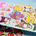thumbnail image 3 of 20 hojas de pegatinas de Sanrio de Hello Kitty, Cinnamoroll, Kuromi, My Melody, pegatinas láser, papelería, juguetes para niños al por mayor., 3 of 6