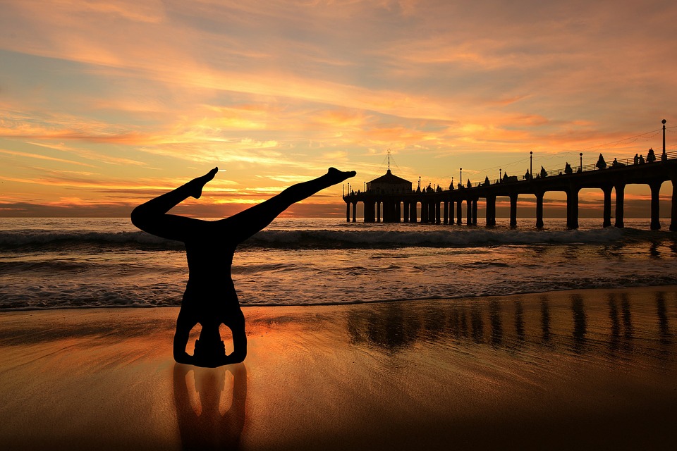 Canvas Print Headstand Sunset Beach Yoga On The Orange Sky Canvas Print Headstand Sunset Beach