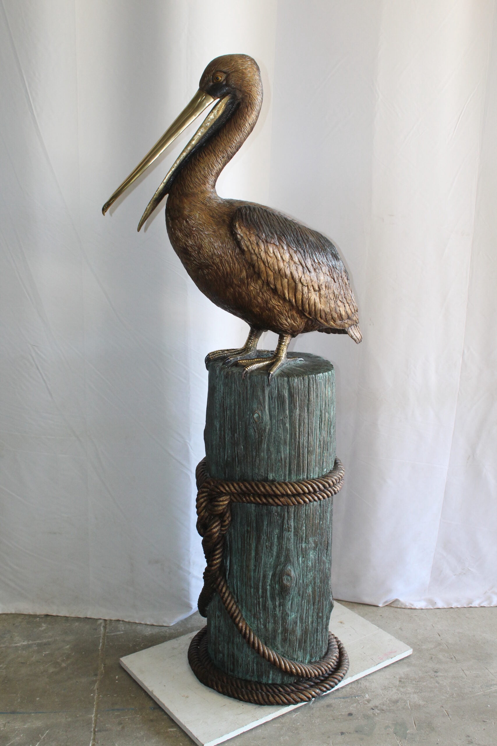 Nifao Pelican Outdoor Fountain Statue Mounted on Tree Stump, Lifesize Bronze Garden Water Feature for Patio & Yard – Garden Outdoor Decor Sculpture, 33"L x 23"W x 73"H