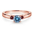 thumbnail image 2 of Gem Stone King 18K Rose Gold Plated Silver Persian Blue Moissanite and Red Rhodolite Garnet 3-Stone Engagement Ring for Women (0.68 Cttw, Gemstone Birthstone, Size 7), 2 of 4