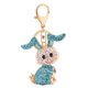 thumbnail image 3 of Encantador accesorio de moda para mujer: llavero con pareja de animales en tono champán, 3 of 6