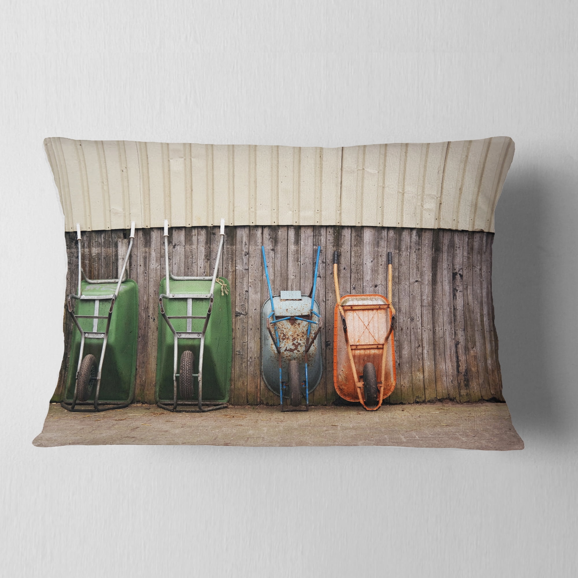 Designart Row of Wheelbarrows - Landscape Photo Throw Pillow - 12x20