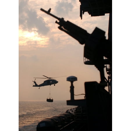 Military Sealift Command Ships - LAMINATED POSTER An MH-60S Knighthawk attached to the Military Sealift Command (MSC) fast combat support ship USNS A Poster Print 24 x 36