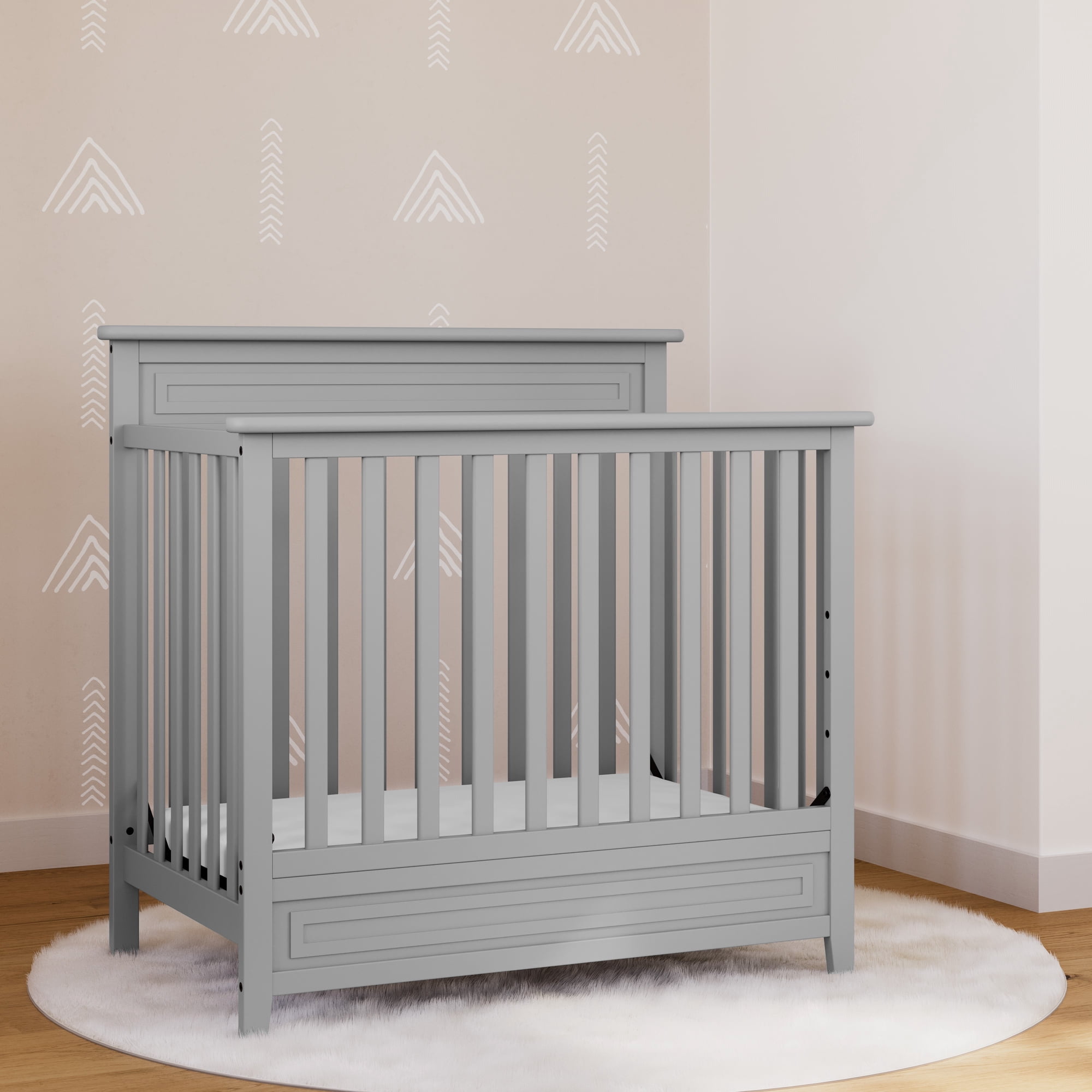Storkcraft Petal Mini 4-in-1 Convertible Baby Crib with Mattress, Pebble Gray