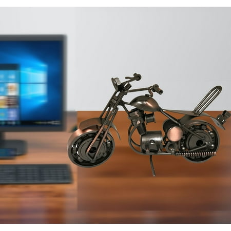 Metal Motorcycle Model, miniature motorcycle made of all metal pieces. Product Size: 7.5x 3.5x 3.25 With moving wheels and the unit can stand on its own. All