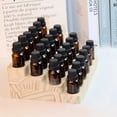 thumbnail image 4 of Expositor de aceites esenciales LONG TAO de 4 niveles para 24 botellas, 4 of 7