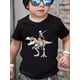 thumbnail image 1 of Halloween T-shirt - Playful Skeleton Striking Dab Pose On Giant T - Rex Skeleton, with Glowing Jack - O'- Lantern, Eerie - Fun Halloween - Themed Boys' T - Shirt, 1 of 6