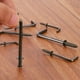 thumbnail image 5 of Ganchos en forma de L Uxcell, paquete de 100, ganchos de tornillo de ángulo recto de 1 1/4 pulgadas para colgar, bronce negro, 5 of 7