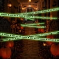 thumbnail image 4 of Halloween Decorative Barrier Tape,Glow In Dark Ghost Warning Strip with Flexible Cuttable Texture,Long Halloween Prop for Yard Escape Room Classroom Party Scene Layout(Green), 4 of 7