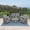 Grey & Grey, variant on VIVIJASON 5-Piece Outdoor Patio Wicker Conversation Sets, All Weather Outdoor Rattan Furniture Set Includes Glider Loveseat, 2 Coffee Table, 2 Glider Rocker Chairs with Cushions, Grey