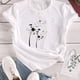 thumbnail image 3 of Camiseta de talla grande para mujer, Top con estampado de huellas de corazón y perro, camiseta informal suave y elástica, ropa de moda urbana 2024, 3 of 5