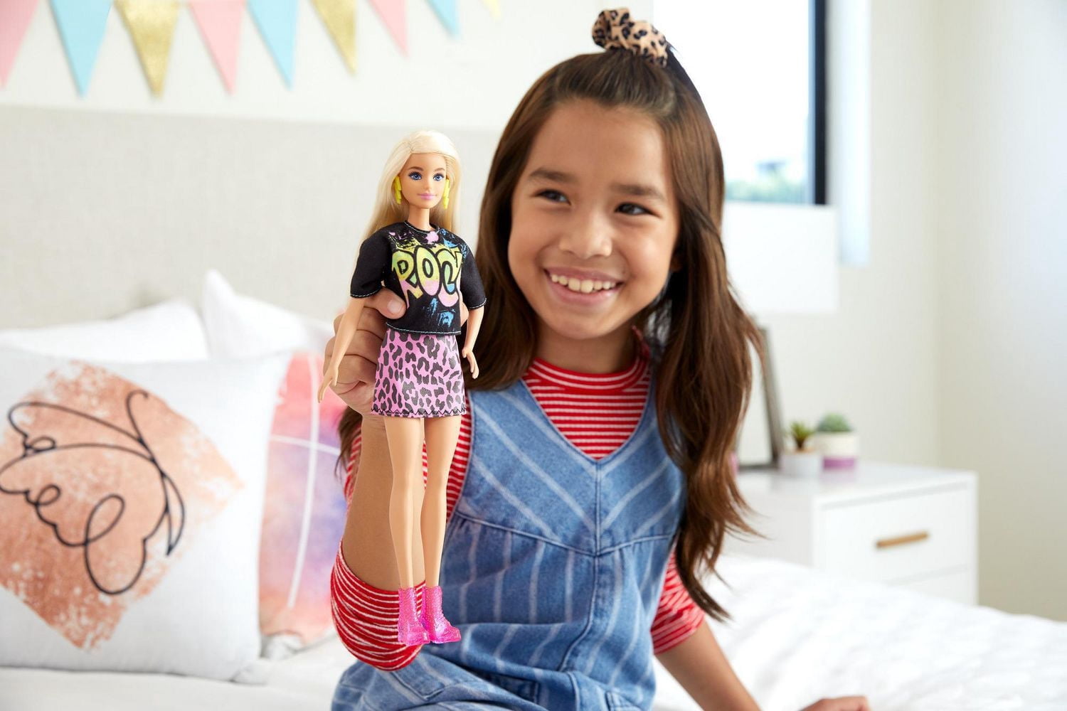 Barbie Fashionistas Doll #155 with Long Blonde Hair Wearing “Rock” Graphic T-Shirt, Animal-Print Skirt, Pink Booties & Earrings