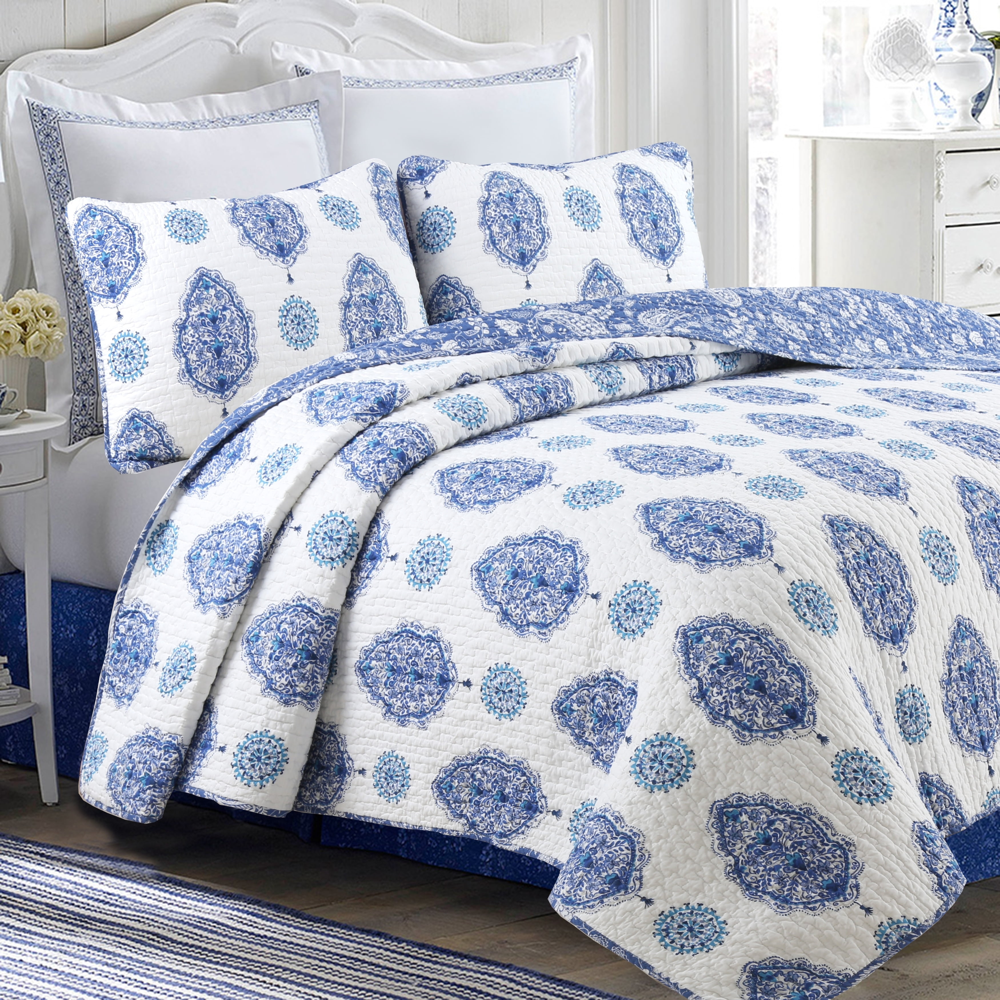 light blue and white quilt