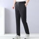thumbnail image 2 of Pantalones de chándal de seda hielo para hombre - Pantalones deportivos holgados con bolsillos - Tejido de poliéster, cintura elástica, cintura alta, adecuados para el gimnasio y el uso diario, 2 of 4