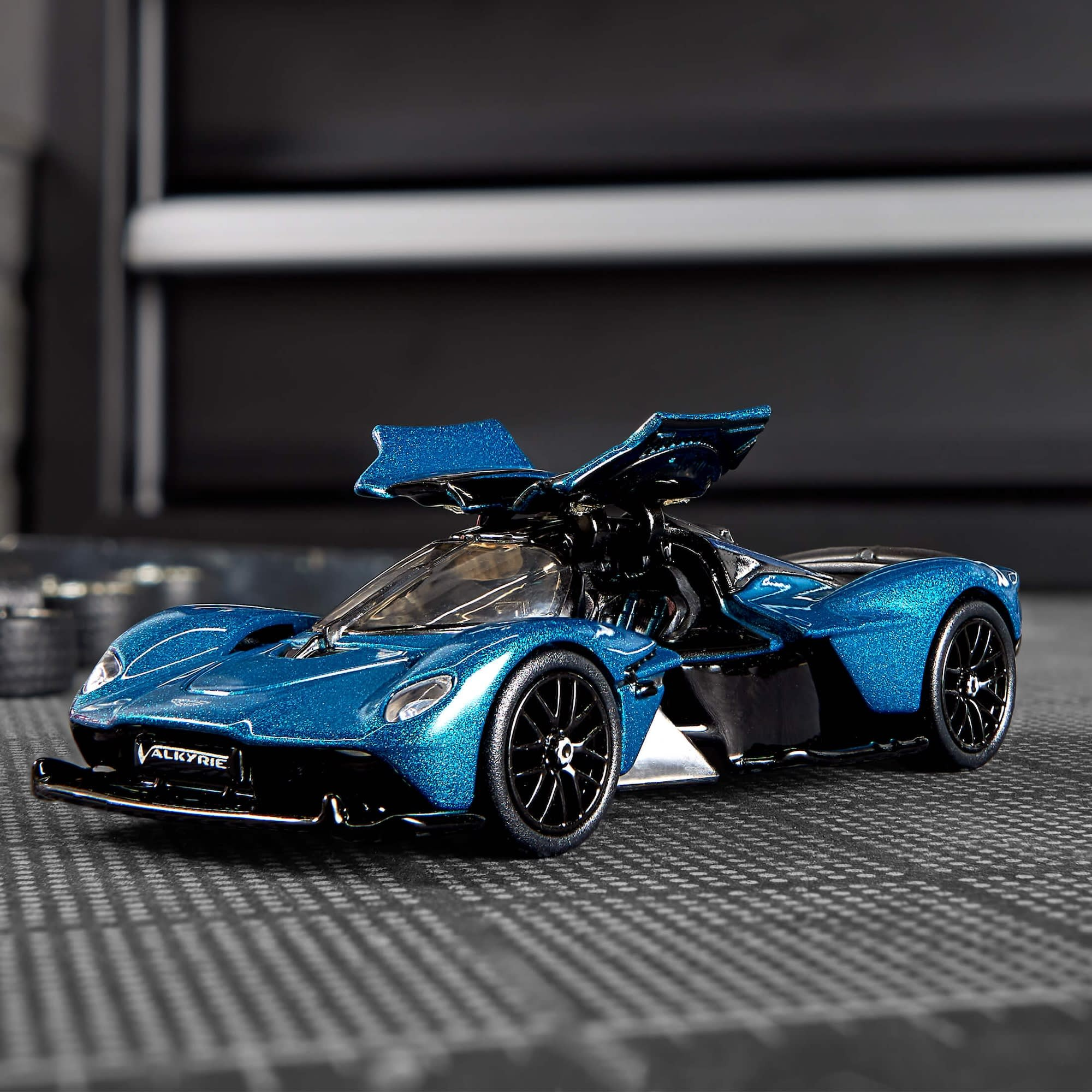 Hot Wheels Elite 64 Aston Martin Valkyrie  Premium Die-Cast Car with Opening Gull-Wing Doors, Real Riders Rubber Tires, Metal Body & Chassis  Metallic Teal  HWR91 Collector Car 1:64 Scale