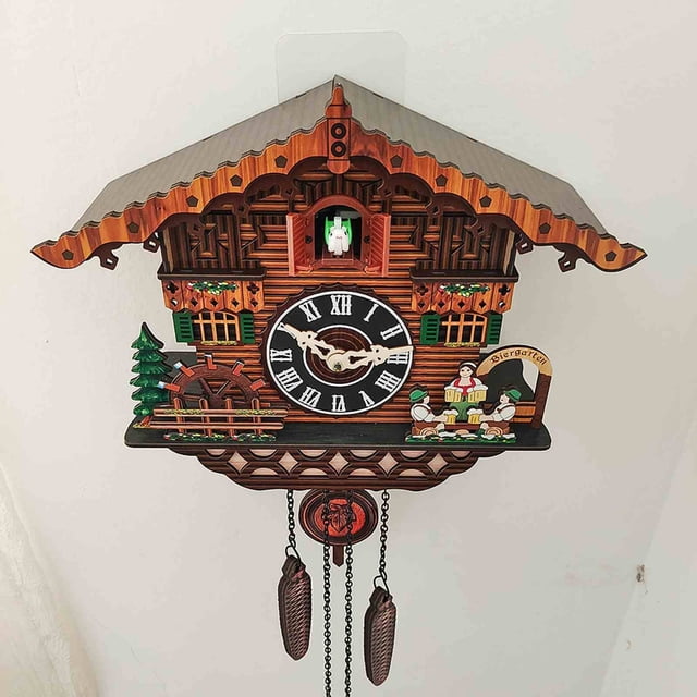Cuckoo Clock, Traditional Chalet House Pendulum Wall Clock, Handcrafted Wooden Quartz Clock with Coo Coo Hourly Chime and Night Shut Off Sensor, Battery Powered for Living Room and Home Decor