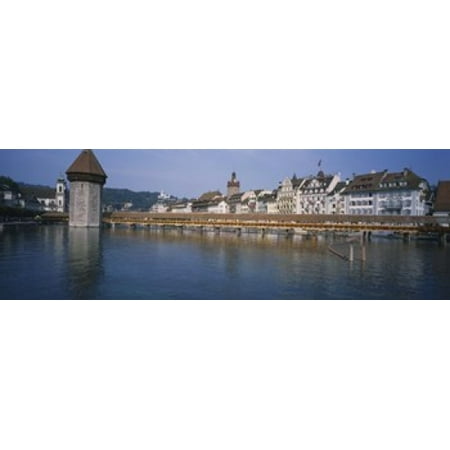 Chapel Length Train Covered bridge over a river Chapel Bridge Reuss River Lucerne Switzerland Canvas Art - Panoramic Images (36 x 12) ()