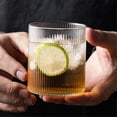 thumbnail image 4 of Vaso de vidrio transparente con rayas verticales, 260 ml, sin tallo, de borosilicato, ideal for agua, bebidas y zumos., 4 of 7