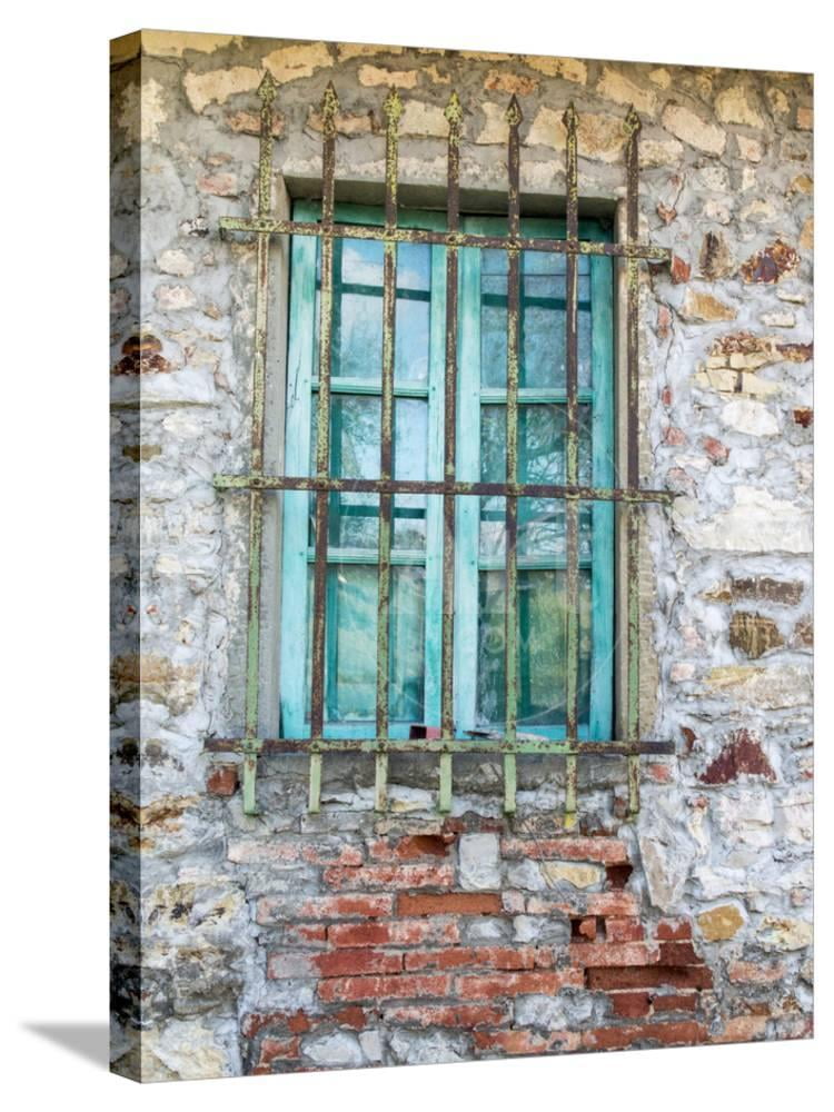 Europe, Italy, Tuscany Turquoise Window on Brick Building Stretched ...