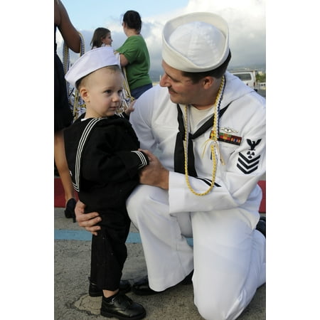 October 29 2010 - US Navy sailor hugs his son during a homecoming celebration for the Los Angeles-class submarine USS Louisville at Joint Base Pearl Harbor-Hickam Hawaii Poster (Best Us Navy Bases)