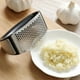 thumbnail image 3 of Prensa de ajo de acero inoxidable cortador de verduras cortador de jengibre molinillo herramienta de cocina práctica portátil con mango Hugtrwg Para estrenar, 3 of 7
