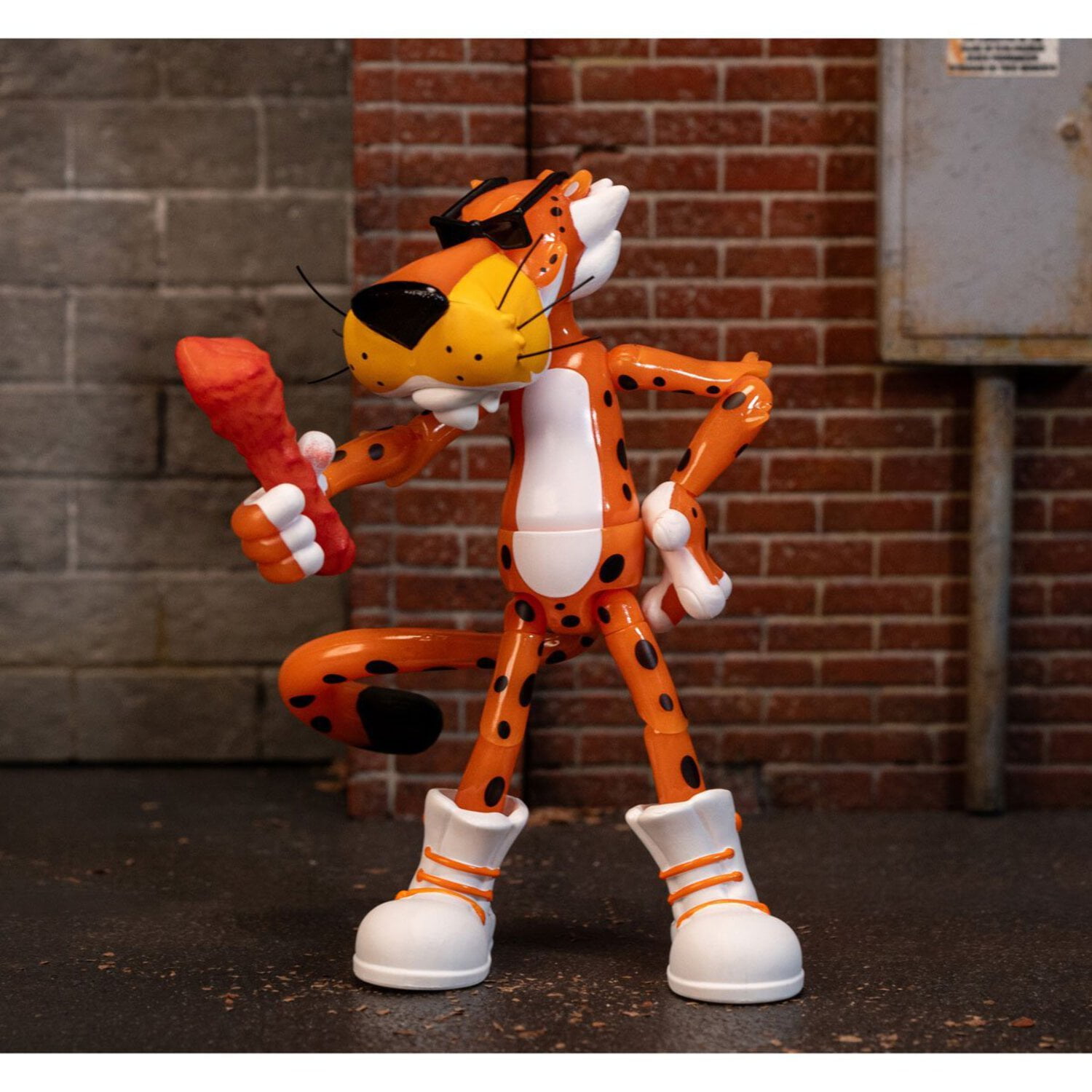 Jada Toys – Cheetos Chester Cheetah Action Figure Flamin' Hot Glow