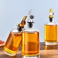 thumbnail image 4 of Inteprter 2 piezas de botella de aceite de vidrio sellada a prueba de fugas reutilizable reemplazo hogar cocina vinagre jarabe dispensador Cocina y Comedor Oro 500ml, 4 of 6