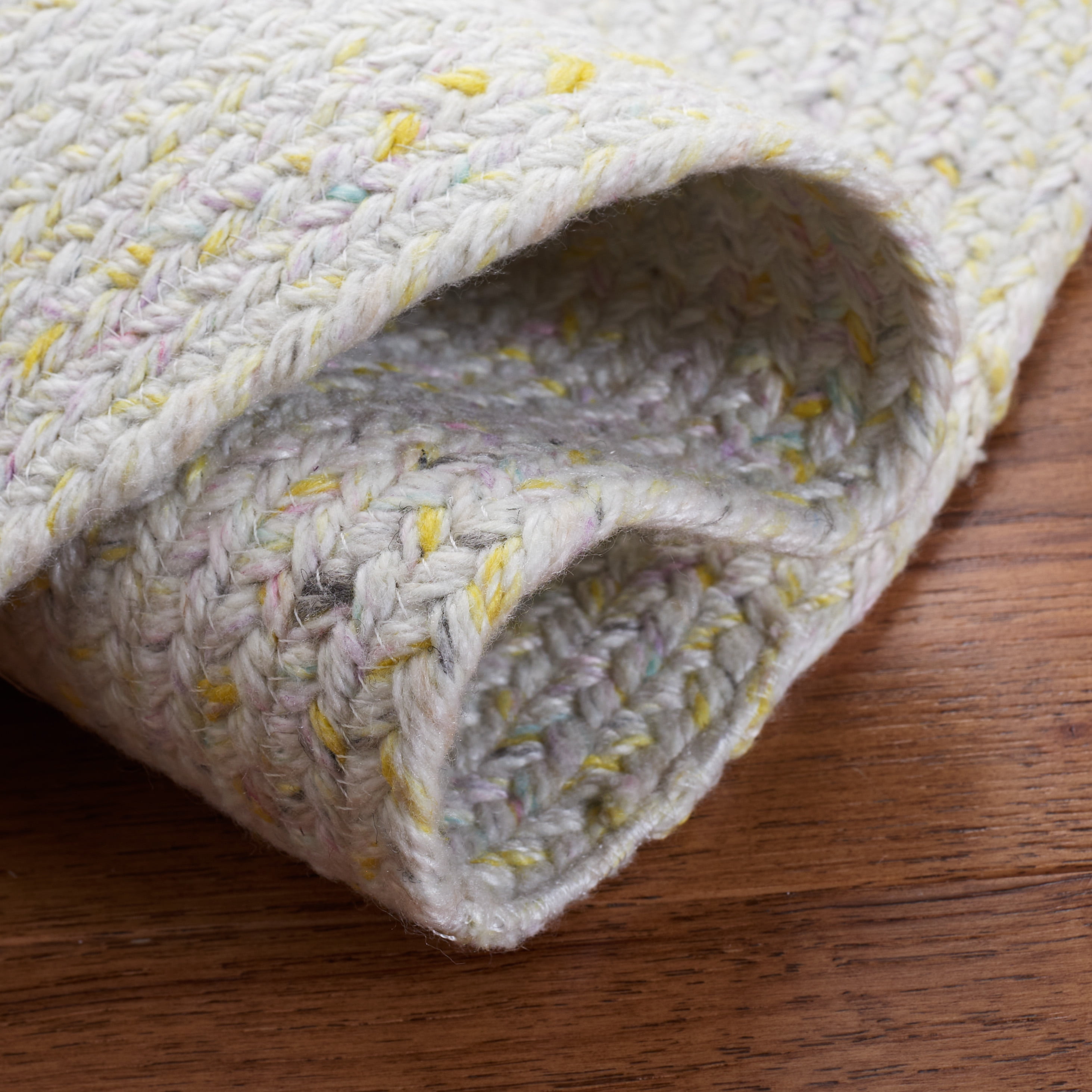 SAFAVIEH Braided Lyla Solid Polyester Reversible Area Rug, Ivory/Yellow, 5' x 5' Round