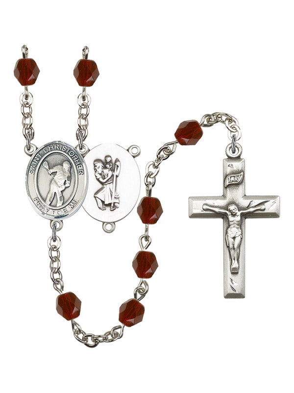 The charm features a Miraculous medal. The Crucifix measures 5/8 x 1/4 Silver Plate Rosary Bracelet features 6mm Sapphire Fire Polished beads 