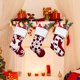 thumbnail image 5 of Medias navideñas (paquete de 3), 17.32 pulgadas, rojas y blancas, con bordado de copos de nieve, tejidas con puños de piel sintética blanca para decoración navideña familiar., 5 of 7
