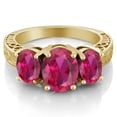 thumbnail image 2 of Gem Stone King 18K Yellow Gold Plated Silver Red Created Ruby 3-Stone Women Ring | 3.88 Cttw | Oval 9X7MM and 7X5MM | Three Stone Wedding Engagement Anniversary Promise Ring for Women | Size 5, 2 of 3