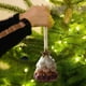 thumbnail image 5 of Adorno navideño de peluche tejido con estrellas en la parte superior, pieza decorativa festiva y encantadora., 5 of 5