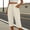 Beige#93, variant on Yteetum Women's Summer Capris Elastic Waist Drawstring Button Straight Leg Capri Pants Women Casual Solid Loose Fits Lightweight Comfy Travel Vacation Cropped Pants