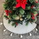 thumbnail image 1 of Pie de árbol navideño Artego tejido bicolor con borlones 122cm diámetro, 1 of 8