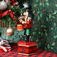 thumbnail image 3 of 12" Animatronic Music Box Nutcracker Figure with Drum – Richly decorated wind up wooden Christmas Decoration - Animated nutcracker decoration plays music and moves. Gold Black Red and Green., 3 of 6