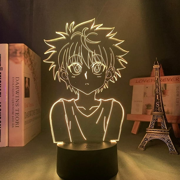 Killua character from hunter x hunter on a study table with books and  notebook