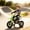 Green, variant on Qaba Kids Motorcycle with Twist Grip Throttle, 12V Electric Motorcycle with Training Wheels, Rear Suspension & Music for Ages, Green