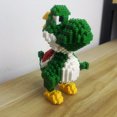 thumbnail image 5 of El juego de juguetes de bloques de construcción de dinosaurios ofrece una experiencia atractiva y educativa. Ensamble el Velociraptor verde y el Tyrannosauru., 5 of 5