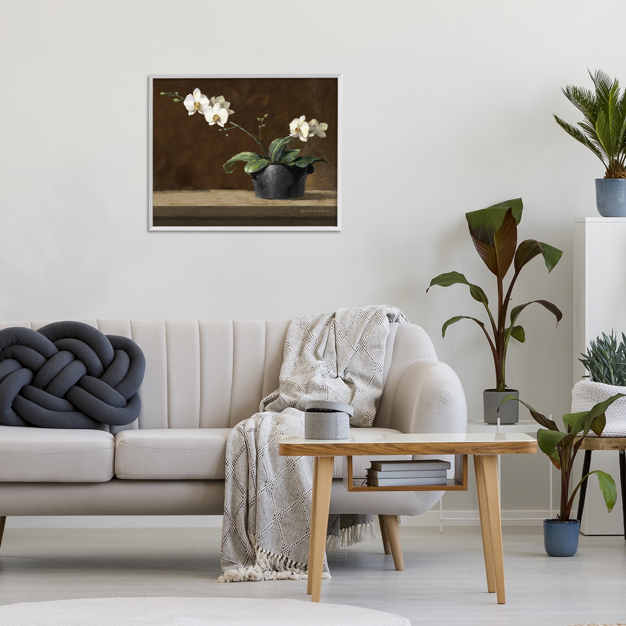 Stupell Industries Potted White Orchid on Ledge White Framed Giclee Art, design by Yumiko Ichikawa
