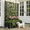 Black, variant on Uforic Outdoor 42.5x14.2x61 in Privacy Screen & Planter Box with Trellis, Raised Garden Bed with Wheels & Drain Plug, All-Weather Black Planter for Climbing Plants, Flowers, Herbs