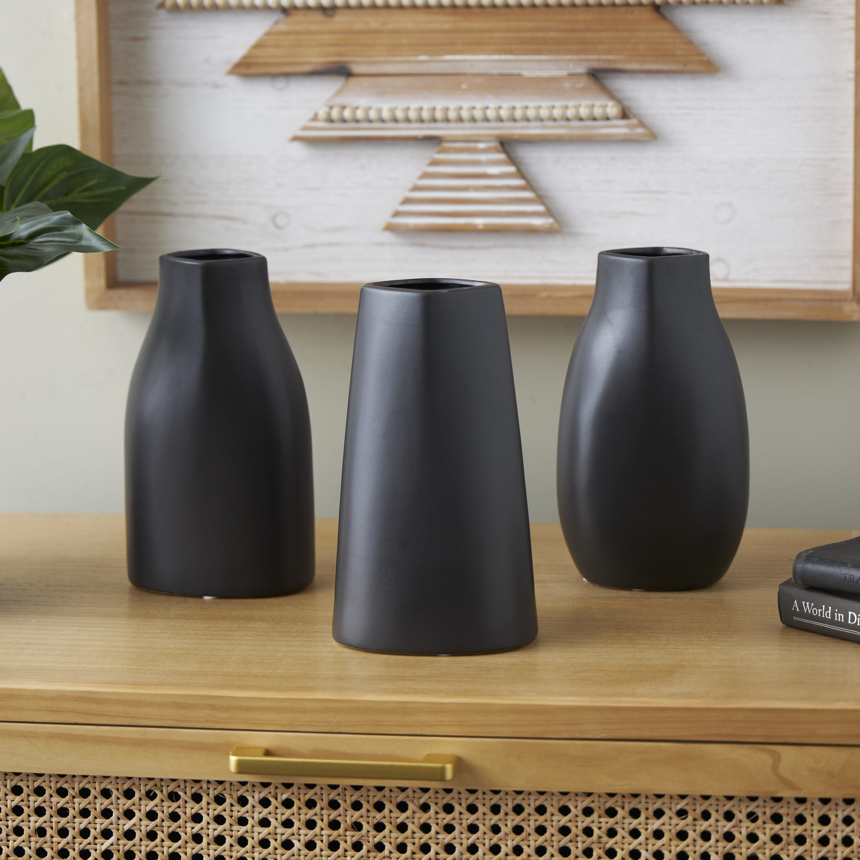 DecMode 5"W, 9"H Minimalistic Dimensional Black Ceramic Vase with Varying Shapes, Set of 3