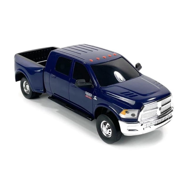 Ram 3500 Mega Cab Dually in blue by Big Country Toys, a 1:20 scale toy truck replica featuring a working tailgate, gooseneck connector, and bumper hitch. Designed with realistic details, rubber side mirrors, and durable construction, this toy is ideal for farm play scenes or as a collectible. The truck is shown in a front-side angle with a glossy blue finish and chrome accents.