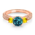 thumbnail image 2 of Gem Stone King 18K Rose Gold Plated Silver London Blue Topaz Yellow Sapphire and White Moissanite Engagement Ring for Women (2.50 Cttw, Gemstone November Birthstone, Round 7MM and 4MM, Size 9), 2 of 3
