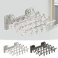 thumbnail image 4 of COM1950s Suction Cup Drying Rack Foldable with 20 Clips, No-Drill Space Saving Sock and Towel Organizer, Multi-Clip Balcony Bathroom Dryer Collapsible Design, 4 of 8