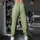 thumbnail image 4 of Pantalones largos para hombre, color liso, informales, a la moda, con cintura elástica, holgados, de poliéster, 4 of 7