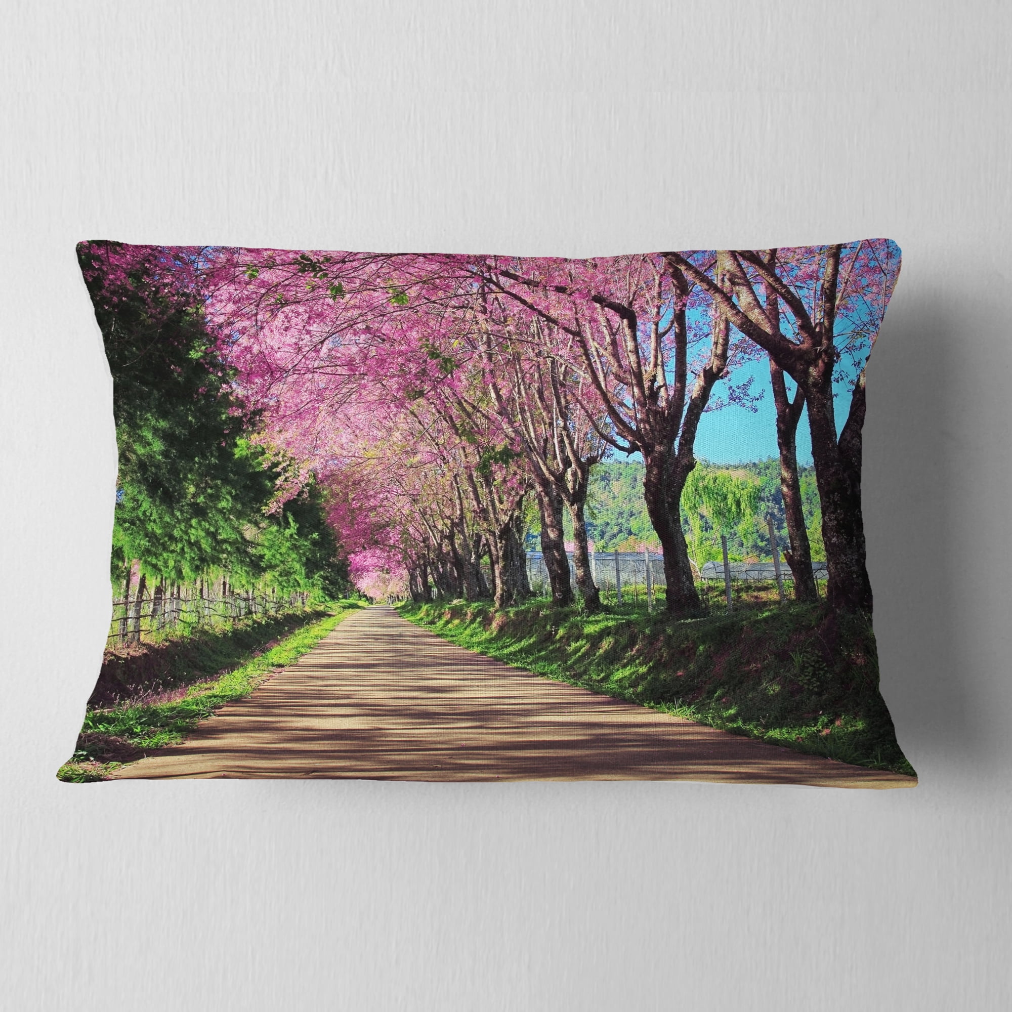 Designart Cherry Blossom Pathway in Chiang Mai - Landscape Printed Throw Pillow - 12x20